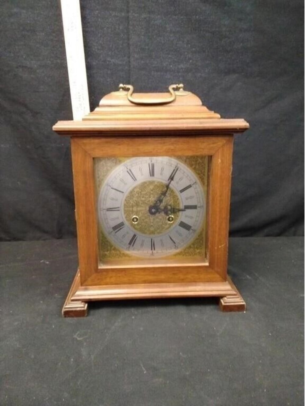 Wooden Bracket Mantel Clock With Brass Handle And Roman Numeral Dial